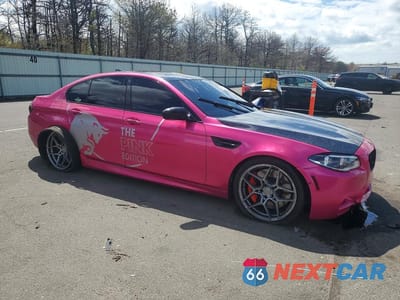 Czwarte zdjęcie samochodu z boku: 2015 BMW M5 VIN:WBSFV9C54FD594335 - miniatura