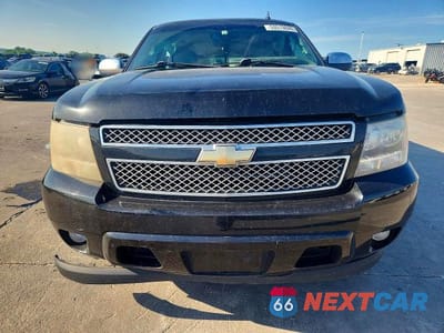 Piąte zdjęcie samochodu w środku: 2011 CHEVROLET SUBURBAN C1500 LTZ VIN:1GNSCKE06BR390872 - miniatura