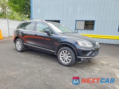 Czwarte zdjęcie samochodu z boku: 2016 VOLKSWAGEN TOUAREG SPORT VIN:WVGEF9BP2GD002219 - miniatura