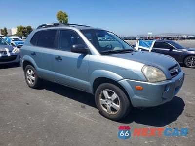 Czwarte zdjęcie samochodu z boku: 2005 HYUNDAI TUCSON GL VIN:KM8JM12B05U147671 - miniatura