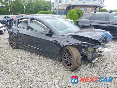 Czwarte zdjęcie samochodu z boku: 2024 TESLA MODEL 3 VIN:5YJ3E1EB2RF822019 - miniatura