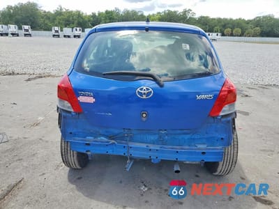 Zdjęcie 6 z 13 samochodu: 2009 TOYOTA YARIS BASE VIN:JTDKT903895260581 - miniatura