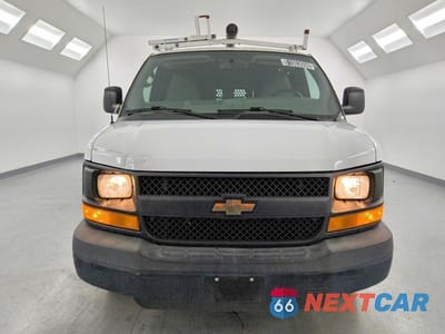 Piąte zdjęcie samochodu w środku: 2014 CHEVROLET EXPRESS G1500 VIN:1GCSGAFX1E1201518 - miniatura