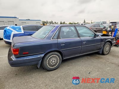 Trzecie zdjęcie samochodu z tyłu: 1991 TOYOTA CAMRY LE VIN:JT2SV22E0M3461047 - miniatura