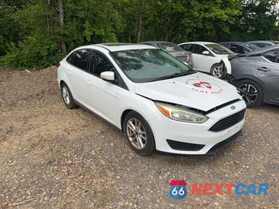 2016 FORD FOCUS SE 1FADP3F25GL264210 - główne zdjęcie licytacji z USA - miniatura