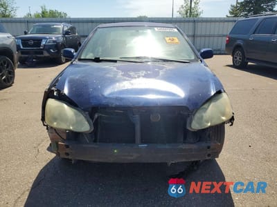 Piąte zdjęcie samochodu w środku: 2003 TOYOTA COROLLA S VIN:1NXBR32E63Z103795 - miniatura