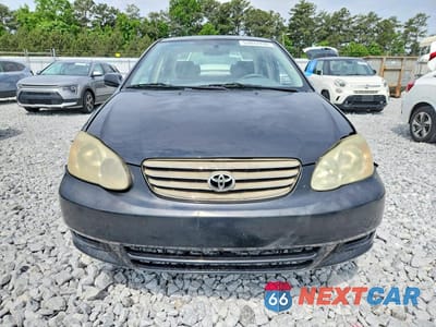 Piąte zdjęcie samochodu w środku: 2003 TOYOTA COROLLA LE VIN:JTDBR32E930049937 - miniatura