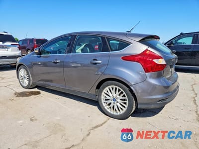Drugie zdjęcie samochodu z przodu: 2013 FORD FOCUS TITANIUM VIN:1FADP3N24DL106258 - miniatura