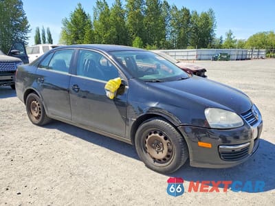 Czwarte zdjęcie samochodu z boku: 2009 VOLKSWAGEN JETTA S VIN:3VWJM71K49M172640 - miniatura
