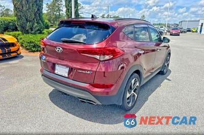 Czwarte zdjęcie samochodu z boku: 2016 HYUNDAI TUCSON LIMITED VIN:KM8J33A21GU080064 - miniatura