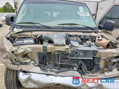 Zdjęcie 12 z 14 samochodu: 2003 FORD ECONOLINE E150 WAGON VIN:1FMRE11L23HB04353 - miniatura