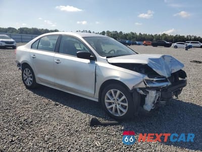 Czwarte zdjęcie samochodu z boku: 2015 VOLKSWAGEN JETTA SE VIN:3VWD17AJXFM223146 - miniatura