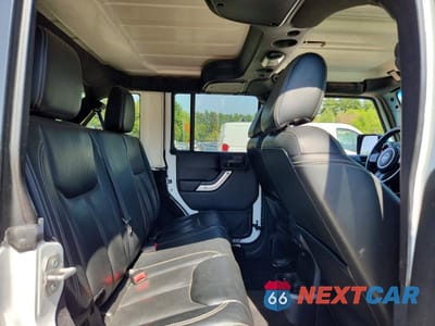 Zdjęcie 11 z 13 samochodu: 2015 JEEP WRANGLER UNLIMITED SAHARA VIN:1C4BJWEG0FL685882 - miniatura