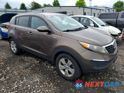 Czwarte zdjęcie samochodu z boku: 2012 KIA SPORTAGE LX VIN:KNDPBCA23C7263122 - miniatura