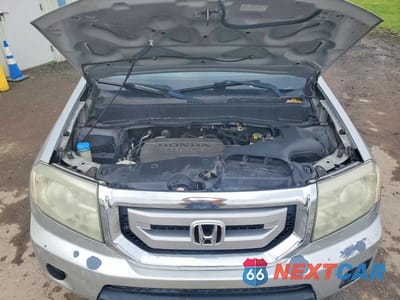 Zdjęcie 12 z 13 samochodu: 2011 HONDA PILOT LX VIN:5FNYF4H20BB059827 - miniatura