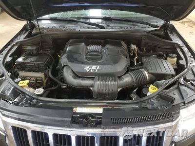 Zdjęcie 12 z 13 samochodu: 2013 JEEP GRAND CHEROKEE LAREDO VIN:1C4RJFAGXDC505311 - miniatura