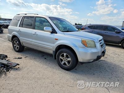 Czwarte zdjęcie samochodu z boku: 2006 HONDA PILOT EX VIN:2HKYF18726H528580 - miniatura