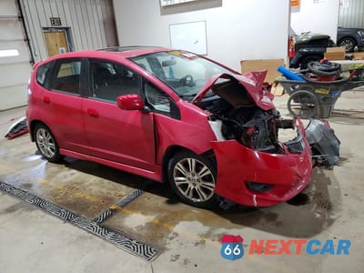 Czwarte zdjęcie samochodu z boku: 2009 HONDA FIT SPORT VIN:JHMGE88489S044236 - miniatura