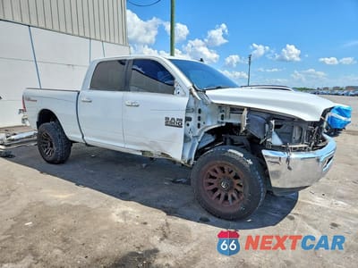 Czwarte zdjęcie samochodu z boku: 2015 RAM 2500 SLT VIN:3C6UR5DJ4FG620563 - miniatura