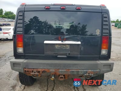 Zdjęcie 6 z 13 samochodu: 2004 HUMMER H2 VIN:5GRGN23U24H112847 - miniatura