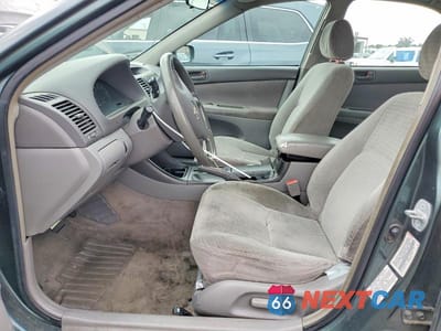 Zdjęcie 7 z 12 samochodu: 2002 TOYOTA CAMRY LE VIN:JTDBE32K420117173 - miniatura