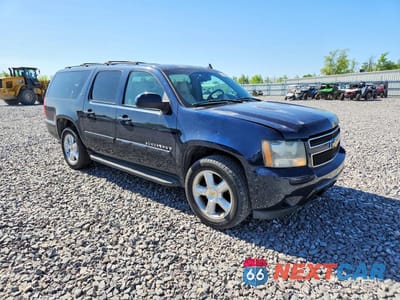Czwarte zdjęcie samochodu z boku: 2007 CHEVROLET SUBURBAN C1500 VIN:1GNFC16017J173696 - miniatura
