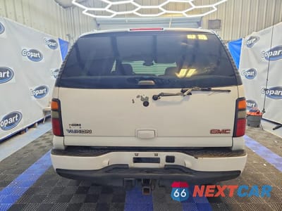 Zdjęcie 6 z 13 samochodu: 2006 GMC YUKON DENALI VIN:1GKEK63U86J154741 - miniatura