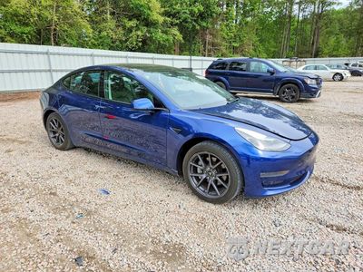 Czwarte zdjęcie samochodu z boku: 2021 TESLA MODEL 3 VIN:5YJ3E1EA1MF090014 - miniatura