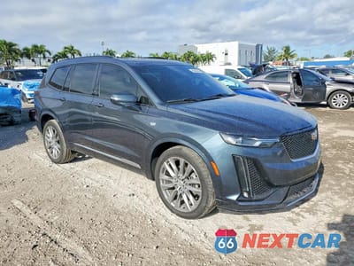 Czwarte zdjęcie samochodu z boku: 2021 CADILLAC XT6 SPORT VIN:1GYKPGRSXMZ156060 - miniatura