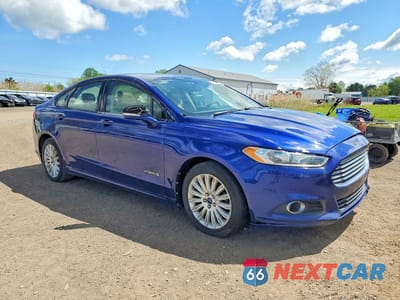 Czwarte zdjęcie samochodu z boku: 2013 FORD FUSION SE HYBRID VIN:3FA6P0LU7DR175670 - miniatura