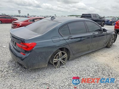 Trzecie zdjęcie samochodu z tyłu: 2019 BMW 740 I VIN:WBA7E2C5XKB217854 - miniatura