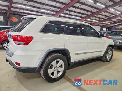 Trzecie zdjęcie samochodu z tyłu: 2012 JEEP GRAND CHEROKEE LAREDO VIN:1C4RJFAG7CC220211 - miniatura
