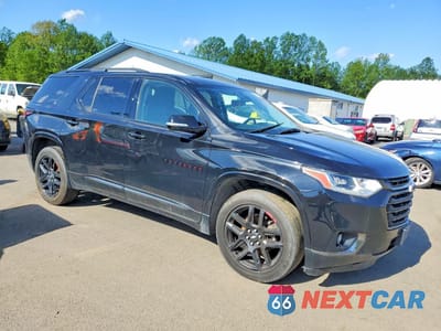 Czwarte zdjęcie samochodu z boku: 2019 CHEVROLET TRAVERSE PREMIER VIN:1GNEVKKW2KJ181787 - miniatura