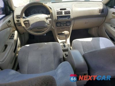 Zdjęcie 8 z 12 samochodu: 2001 TOYOTA COROLLA LE VIN:2T1BR12E01C427716 - miniatura