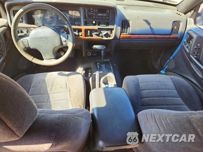 Zdjęcie 8 z 13 samochodu: 1998 JEEP GRAND CHEROKEE LAREDO VIN:1J4FX58S5WC340903 - miniatura