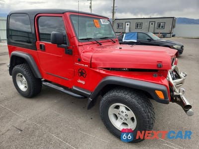 Czwarte zdjęcie samochodu z boku: 1997 JEEP WRANGLER / TJ SE VIN:1J4FY29P2VP471316 - miniatura