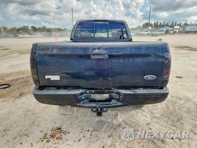 Zdjęcie 6 z 13 samochodu: 2001 FORD F150 VIN:1FTRX18WX1NA89422 - miniatura