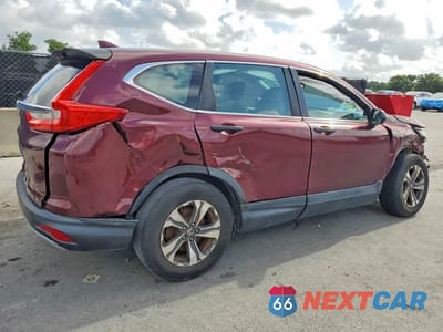 Trzecie zdjęcie samochodu z tyłu: 2019 HONDA CR-V LX VIN:2HKRW5H3XKH414331 - miniatura