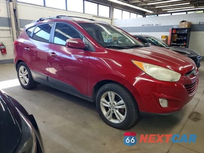 Czwarte zdjęcie samochodu z boku: 2013 HYUNDAI TUCSON GLS VIN:KM8JU3ACXDU728552 - miniatura