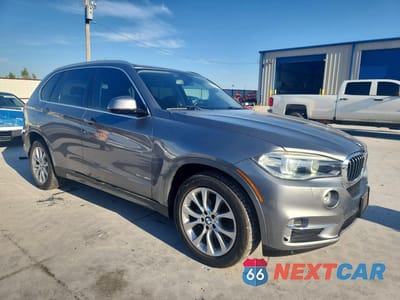 Czwarte zdjęcie samochodu z boku: 2014 BMW X5 SDRIVE35I VIN:5UXKR2C58E0C00280 - miniatura