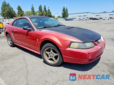 Czwarte zdjęcie samochodu z boku: 2001 FORD MUSTANG VIN:1FAFP40451F203583 - miniatura