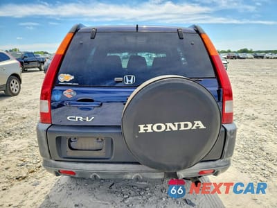 Zdjęcie 6 z 12 samochodu: 2002 HONDA CR-V LX VIN:JHLRD68402C003443 - miniatura