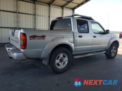 Trzecie zdjęcie samochodu z tyłu: 2001 NISSAN FRONTIER XE VIN:1N6ED27Y61C382887 - miniatura