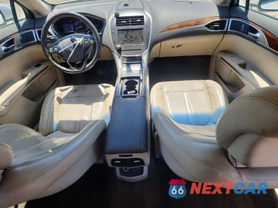 Zdjęcie 8 z 12 samochodu: 2016 LINCOLN MKZ HYBRID VIN:3LN6L2LU1GR627095 - miniatura