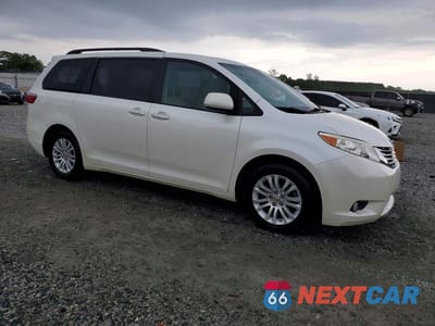 Czwarte zdjęcie samochodu z boku: 2016 TOYOTA SIENNA XLE 8-PASSENGER VIN:5TDYK3DC9GS731715 - miniatura