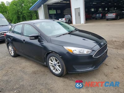Czwarte zdjęcie samochodu z boku: 2017 FORD FOCUS SE VIN:1FADP3F28HL316589 - miniatura