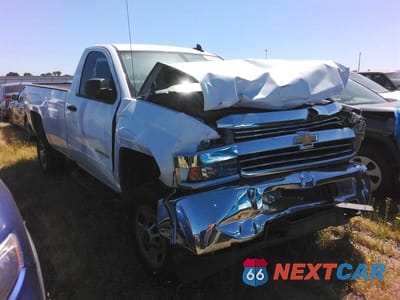 Czwarte zdjęcie samochodu z boku: 2017 CHEV SILVERADO C1500 HEAVY DUTY VIN:1GC0CUEG0HZ330409 - miniatura