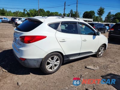 Trzecie zdjęcie samochodu z tyłu: 2012 HYUNDAI TUCSON GLS VIN:KM8JUCAC8CU336927 - miniatura