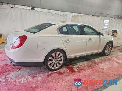 Trzecie zdjęcie samochodu z tyłu: 2013 LINCOLN MKS VIN:1LNHL9FTXDG616412 - miniatura
