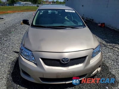 Piąte zdjęcie samochodu w środku: 2010 TOYOTA COROLLA BASE VIN:2T1BU4EE7AC231087 - miniatura